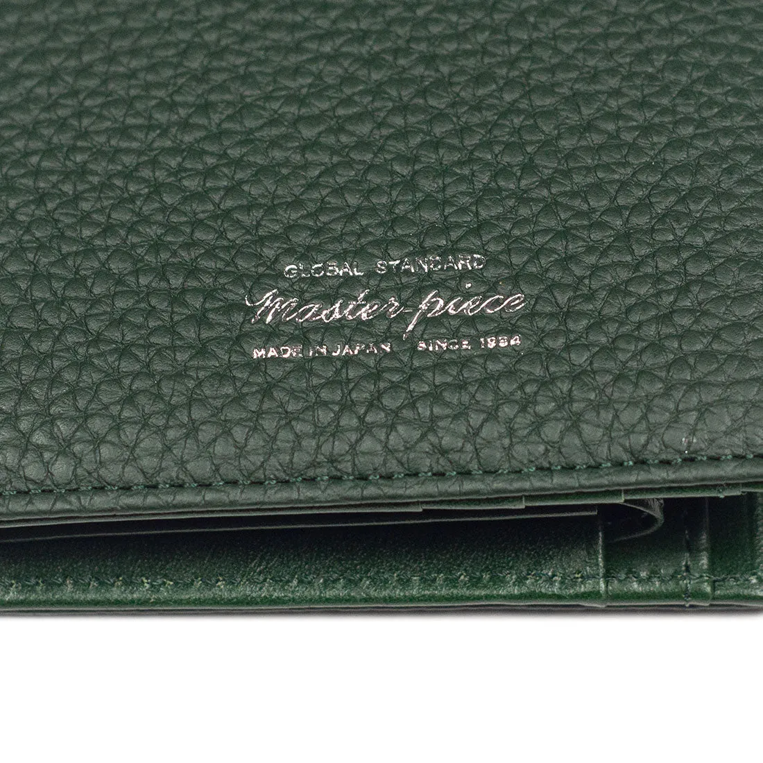 "Deater" billfold wallet with coin purse in bottle green shrunken leather